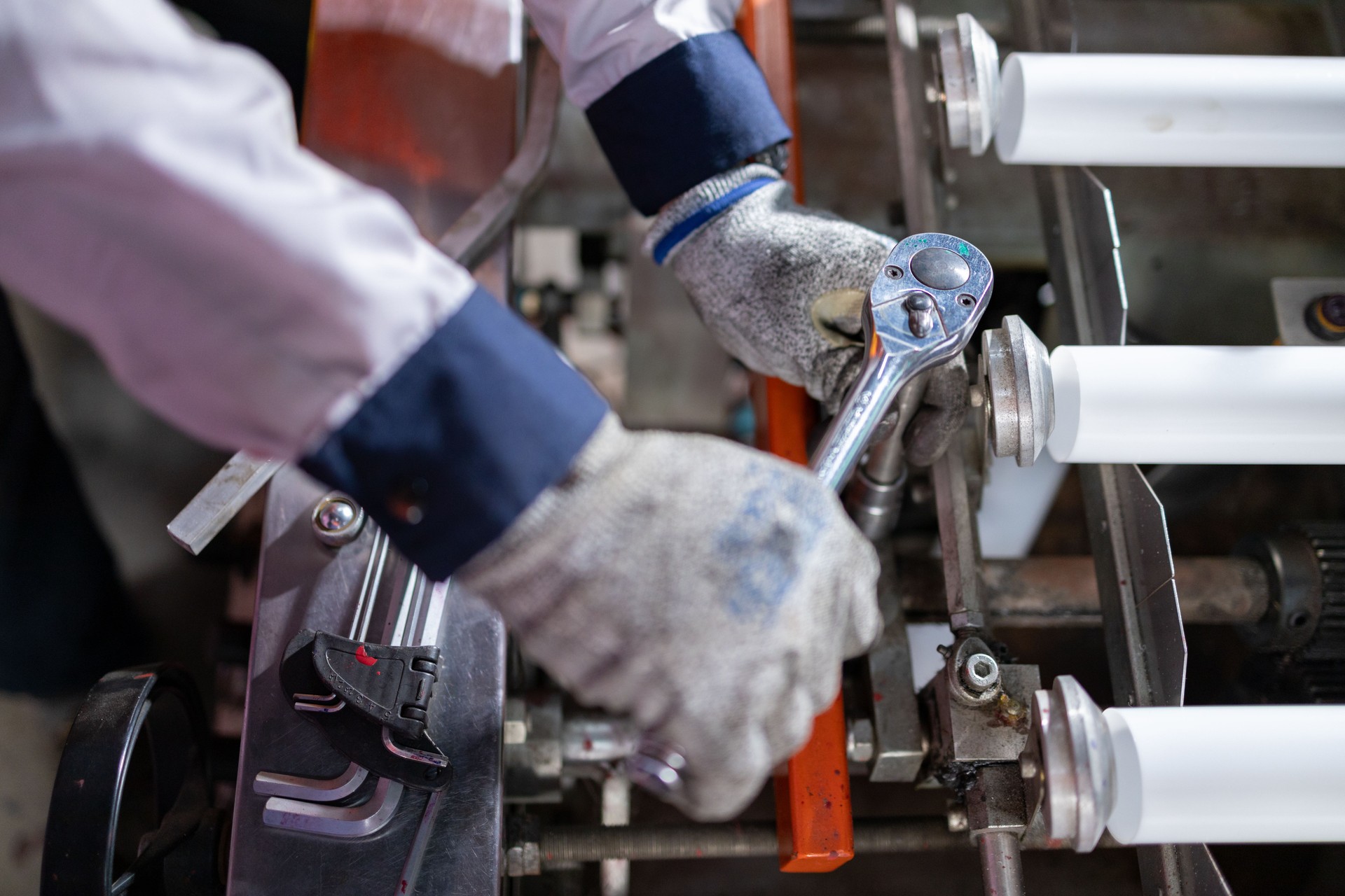 Worker Adjusting Machine with Wrench